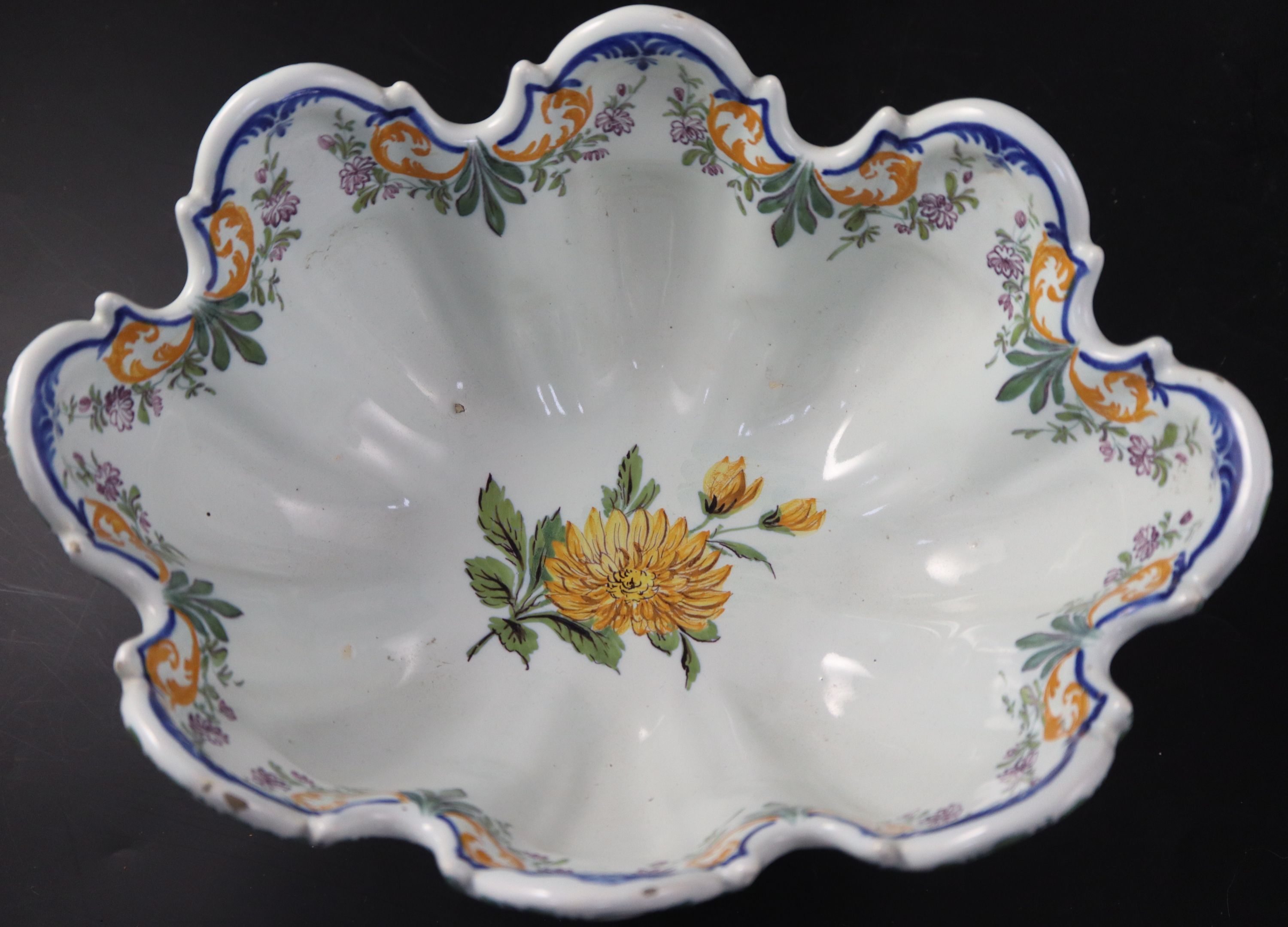 Two Nove faience monteiths, late 19th century, width 17cm